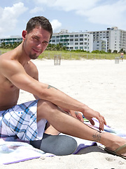 Hot young beach guy gets a taste of monster cock