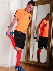 Tattooed boy Dom Ully jerks off with his Nike shoe.