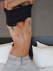 Gorgeous twink Jake Diamante busts a nut onto his abs.