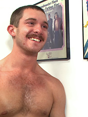 Sexy stud endures electricity, cocks and feet in a clothing store.