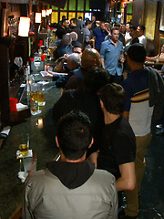 Naked ripped stud gets humiliated and used in a crowded public bar.