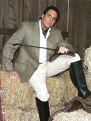Marcello dressed in full riding suit masturbating in the stables