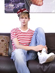 Tattooed Connor Levi busts a big nut onto his stomach.